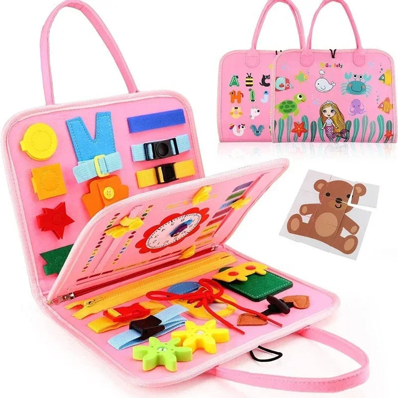 Pink Montessori Busy Board open showing sensory activities with mermaid exterior design and bear jigsaw puzzle card included